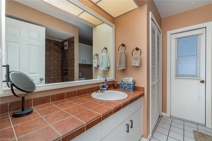 Bathroom featuring vanity and tile patterned floors