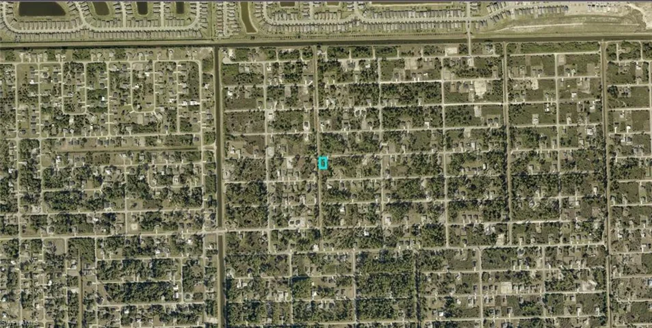 Aerial Map. Highlighting the property’s location within a developed grid of streets and structures