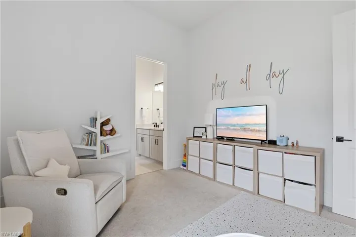 Sitting room with light carpet