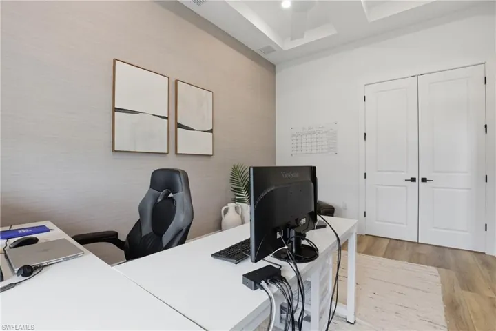 Office featuring light wood-style floors