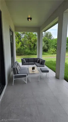 View of patio with outdoor lounge area