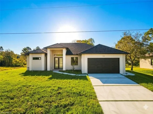 1102  Greenwood  AVE, Lehigh Acres, FL 33972