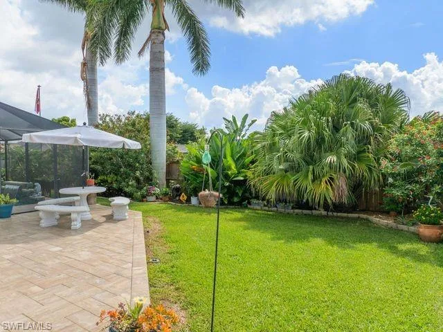 View of yard with a patio area