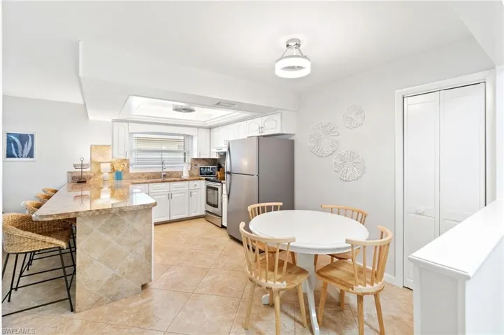 Open kitchen and dining offer two areas for enjoying your meals.