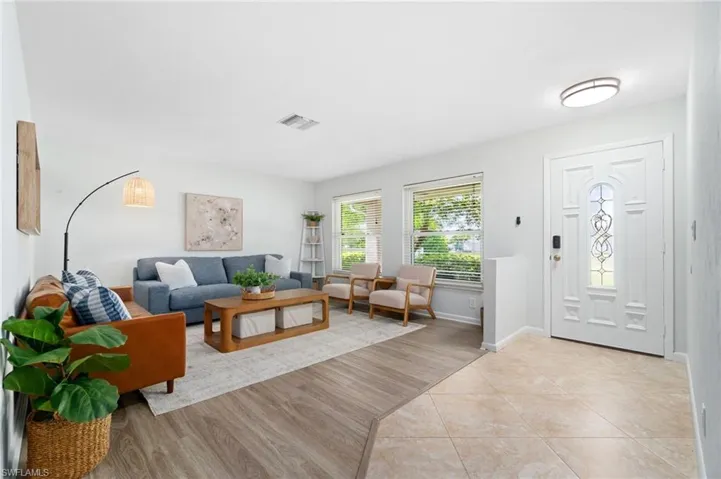 Spacious den/bonus room is open to the foyer entry and freshly painted interior for a move in ready feel.