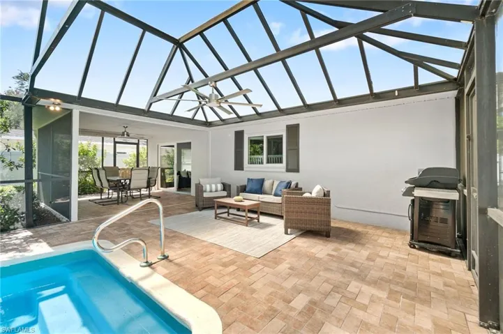 View of swimming pool featuring an outdoor hangout area, ceiling fan, and a patio area
