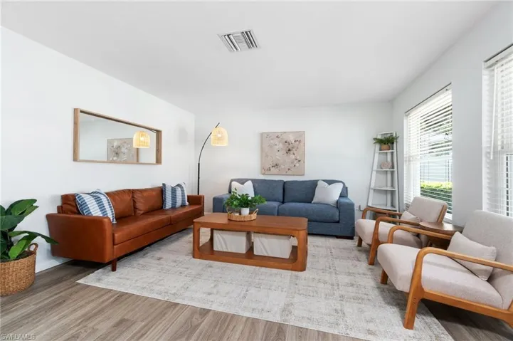 Spacious den/bonus room is open to the foyer entry and freshly painted interior for a move in ready feel.