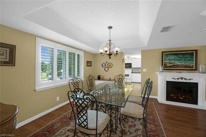 Formal dining with electric fireplace