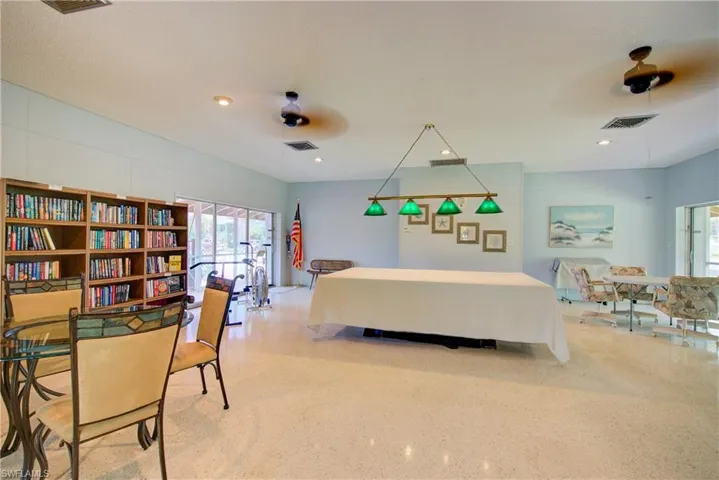 A large community space with Billiards, a Library, and a comfortable seating area