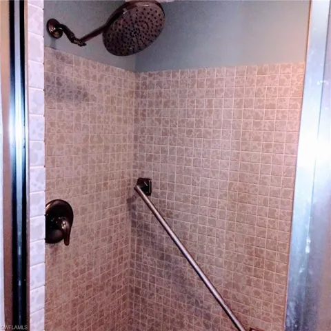 An easy access stand-up shower in the master for the utmost safety