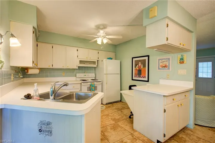 There is no shortage of cabinets & countertops here!