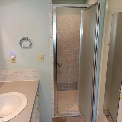 An easy access stand-up shower in the master for the utmost safety