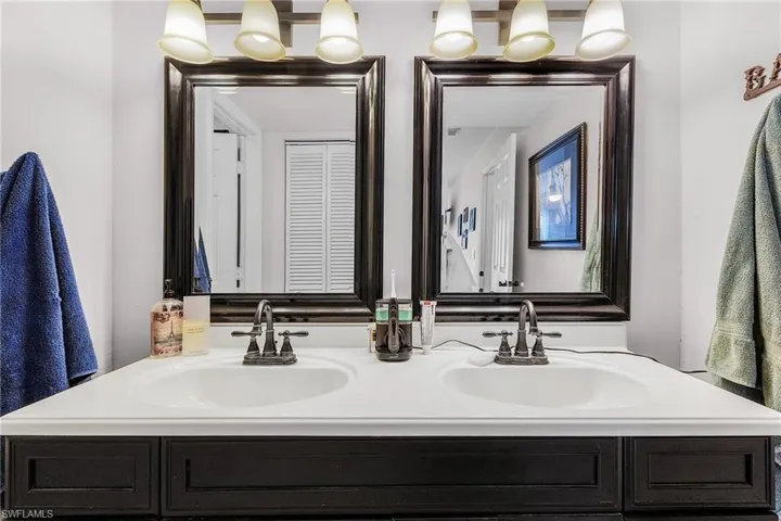 Bathroom with double vanity and a sink