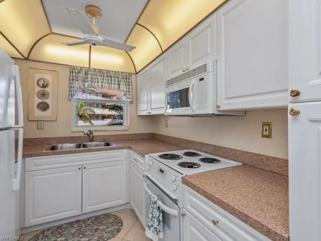 Kitchen with View of the Pool