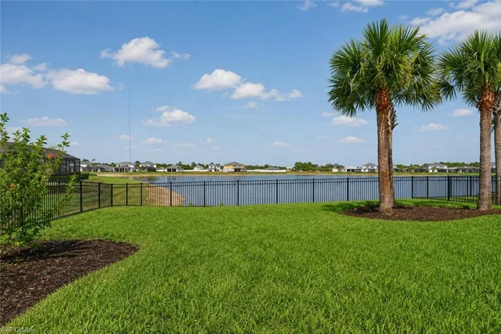 Fenced Yard with lake view