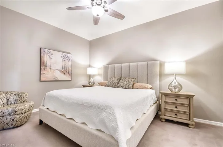 Primary Bedroom en suite with ceiling fan.