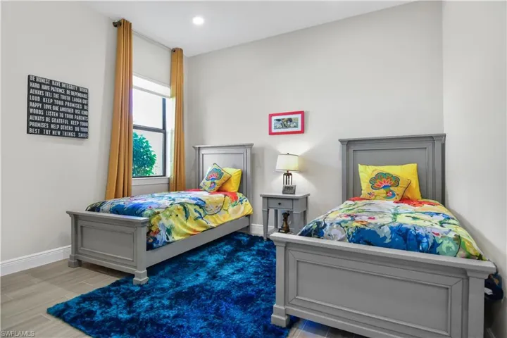 Bedroom with wood-type flooring