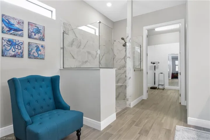 Spacious primary bathroom with walk-in shower
