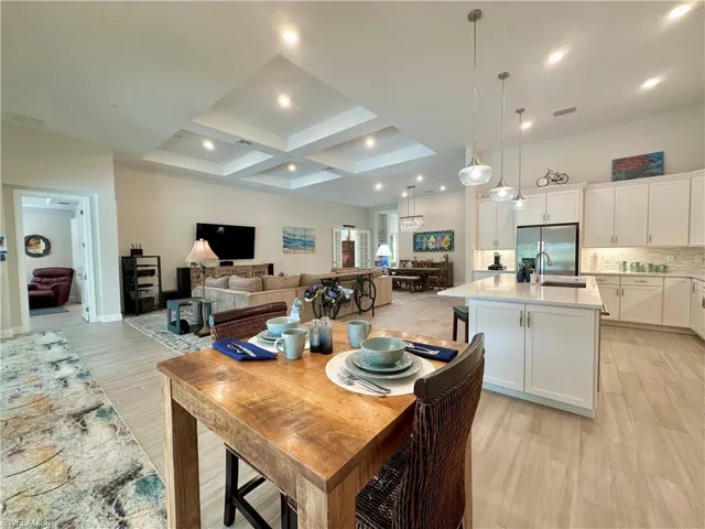 Open floor plan with high ceilings