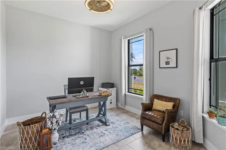 In the front of this home is a bright and airy office so you could work from home.