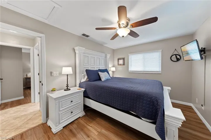 Bedroom featuring light wood-style floors and a ceiling fan