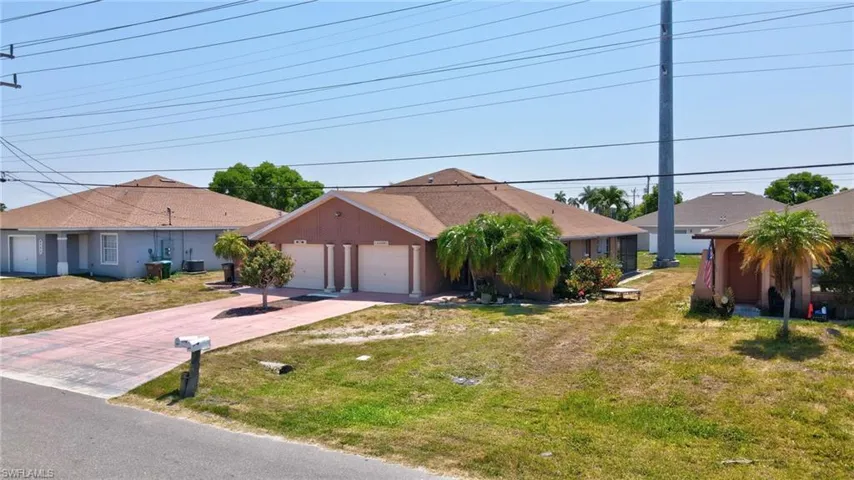 Ranch-style home with a garage