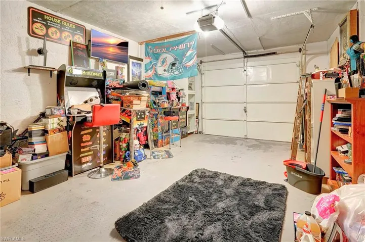 Garage featuring a garage door opener