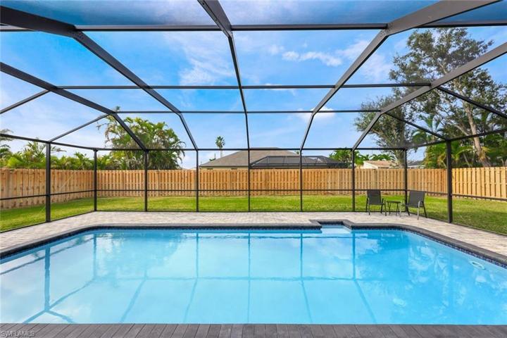 Beautiful, sparkling pool to nice fenced yard