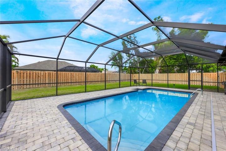 Nice paver surrounded, large pool and private back yard