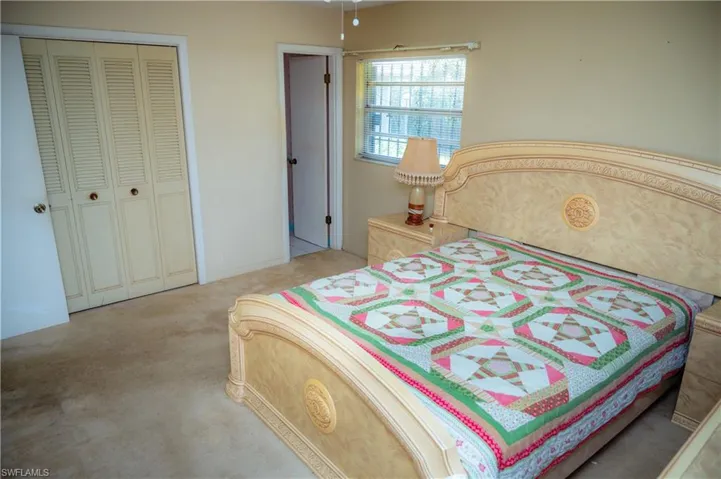 Bedroom featuring carpet flooring and neutral wall tones