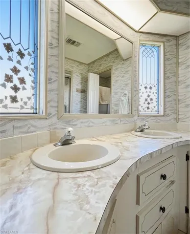 Full bath with double vanity