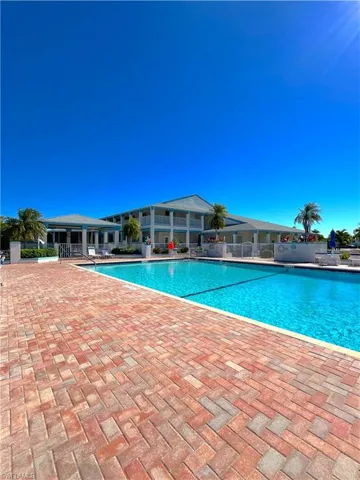 Community pool with a patio area