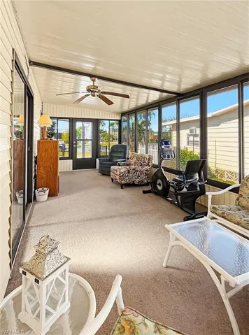 Sunroom with ceiling fan