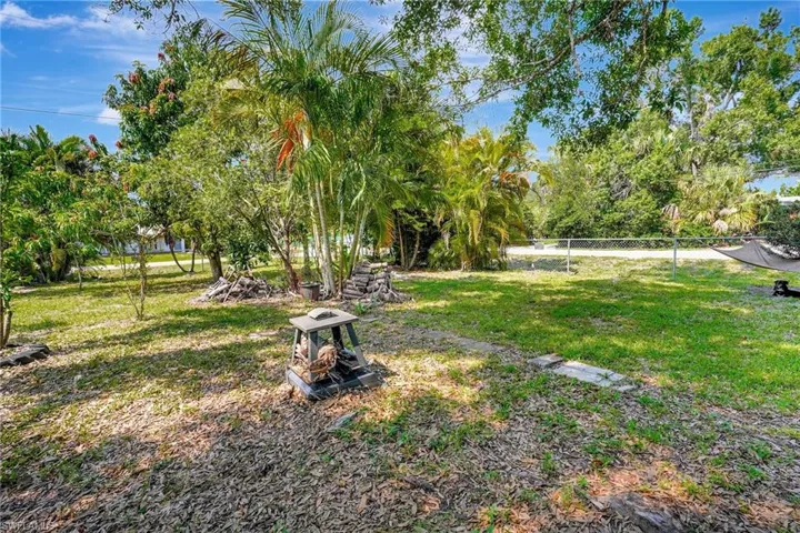 View of yard featuring view of wooded area