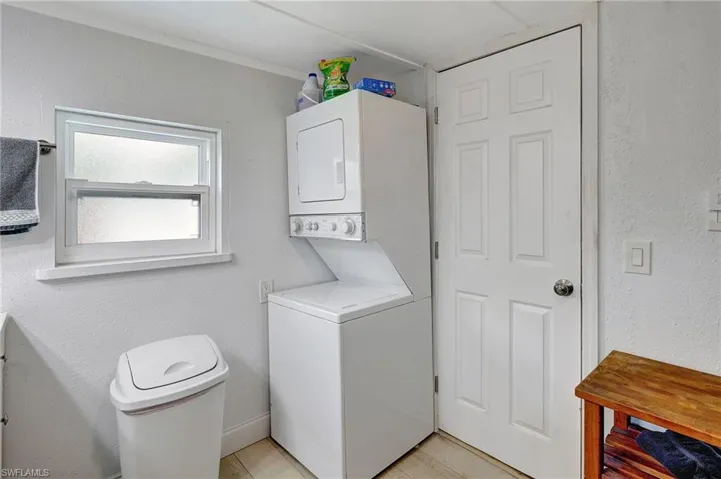 Laundry area with stacked washer / drying machine