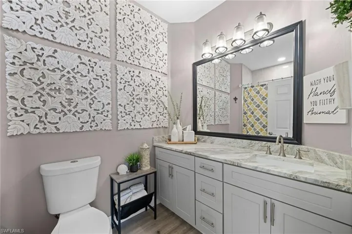 hall bath- granite new tile, toilets, etc