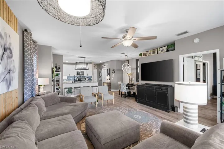 great room opens to kitchen with remodel