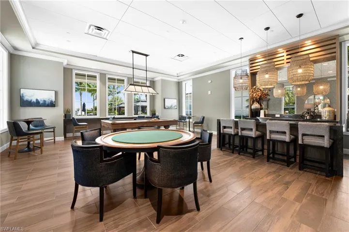 Rec room featuring ornamental molding