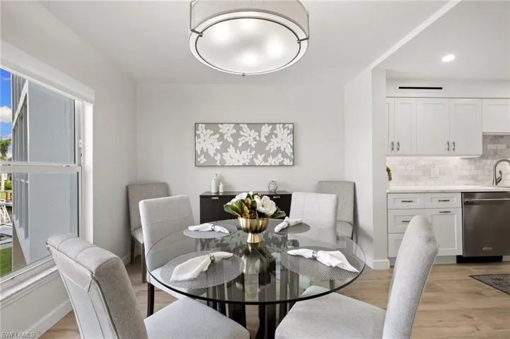 Dining area featuring light hardwood / wood-style flooring and plenty of natural light