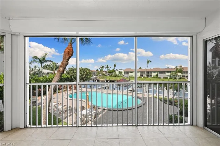 View of swimming pool with a water view