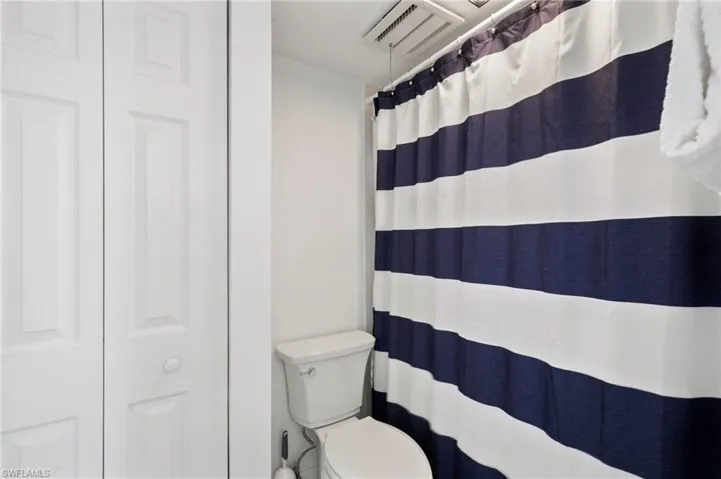 Bathroom with walk in shower and toilet