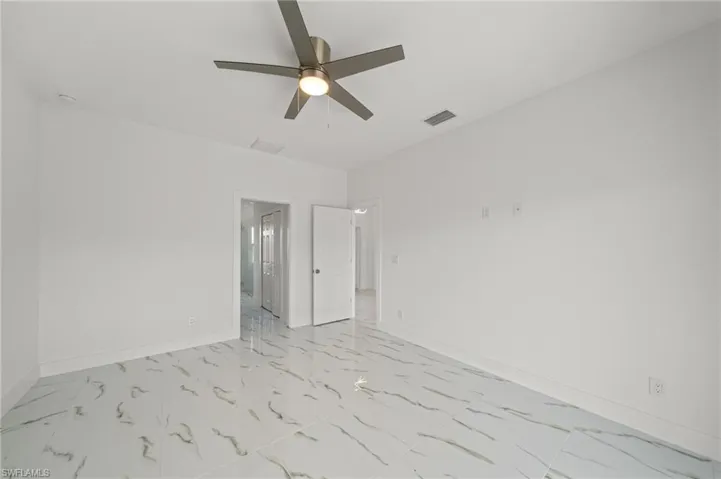 Full bathroom with combined bath / shower with glass door and vanity