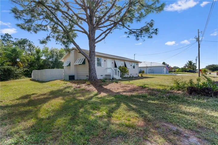 View of property exterior with crawl space
