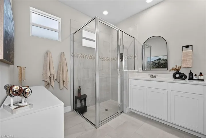 Dual sinks with walk in shower