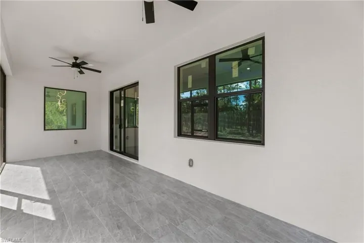 Unfurnished room featuring ceiling fan
