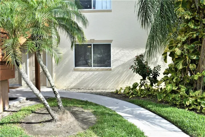 View of side of property with stucco siding