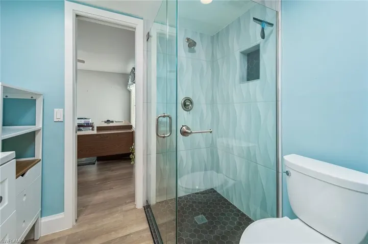 Hallway bath with access to the office/guest bedroom.