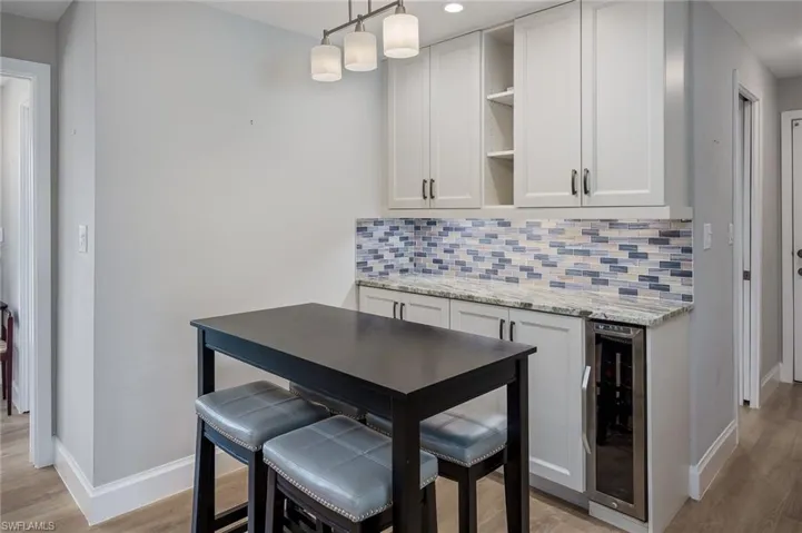 Kitchen dining area with coffee bar and wine fridge!