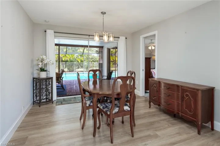 Dining area with sliders to the lanai.