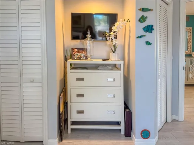 Details with baseboards and wood finished floors